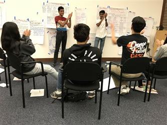 Student Governing Board/Assembly Group listening to two presenters