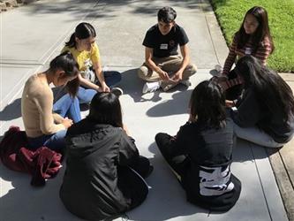 Student Governing Board/Assembly Group Sitting Outside