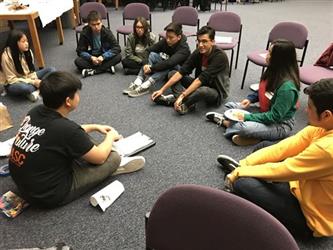 Student Governing Board/Assembly Group having a group discussion
